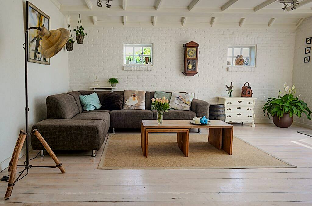 A living room with a couch and coffee table